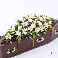 Lily and Rose Casket Spray   White with trailing foliage