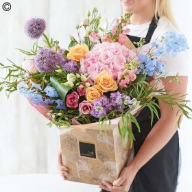 Hand tied bouquet made with the finest flowers
