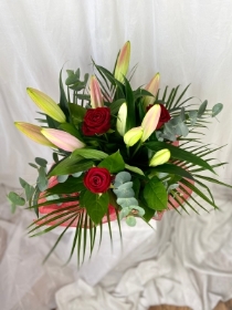 Roses and lily hand tied bouquet