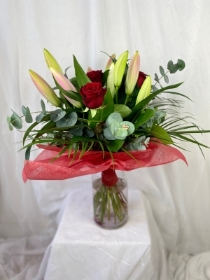 Vase of lilies and roses